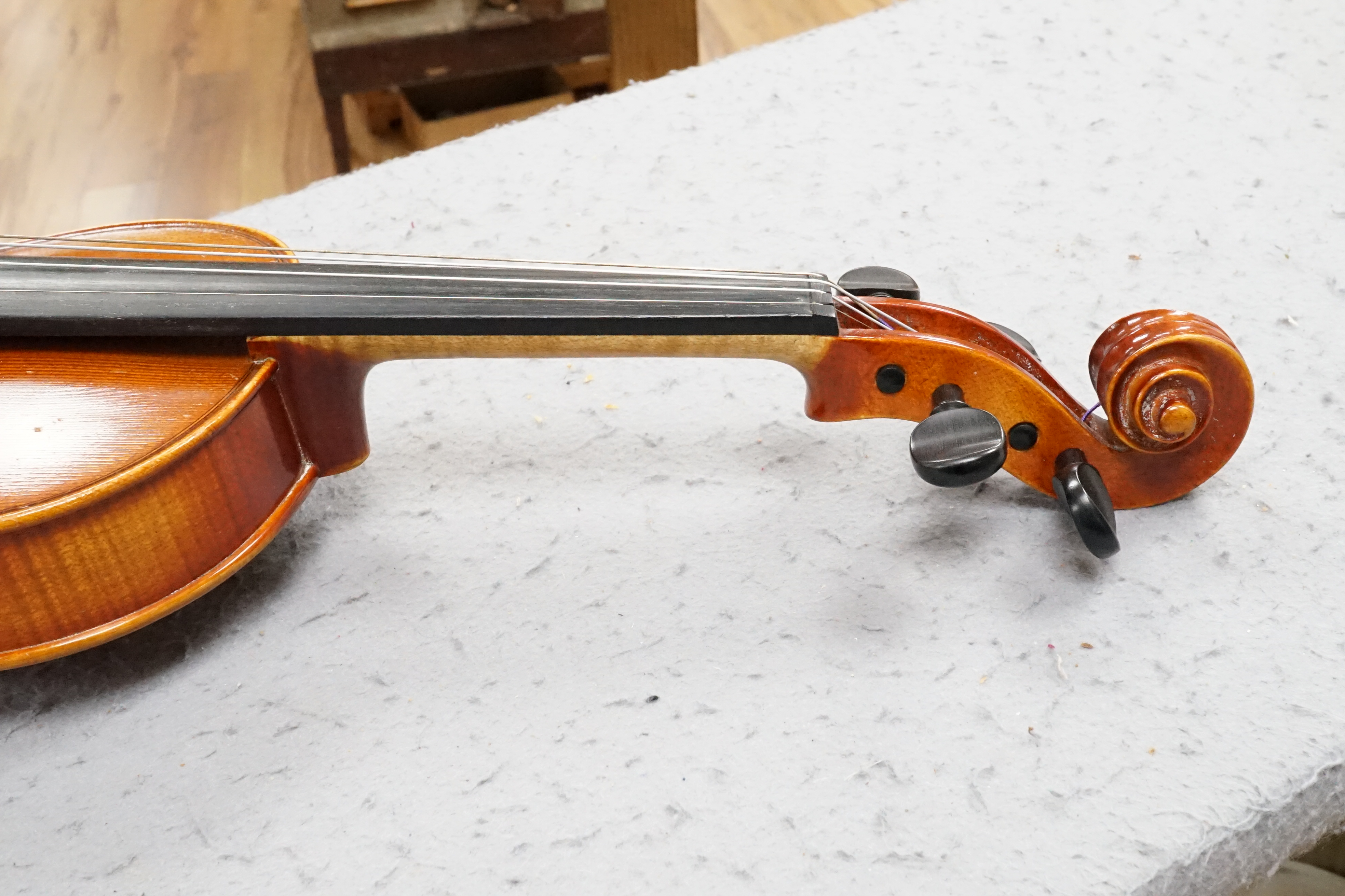 A violin, in fitted case (German)